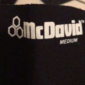 Mc David kids M. compression sleeves black 14”-15”